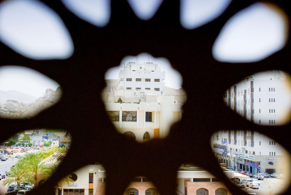 This is a view out of the United Media Services building where I interned at during the summer in 2012 shadowing photographers. My experiencing while interning at UMS mimics this photo, seeing an opportunity, something beautiful, but only being able to capture parts of it. Being a women photographer who is American in an office of Indians and Omanis posed many barriers I had to overcome thus depressing my confidence and creativity with taking photos. Nevertheless, something beautiful emerged from this experience- I am glad I have this photo to remind myself. 