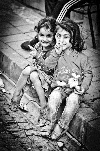 The portrait of poverty and happiness. Their approach went straight to my heart