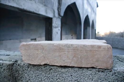 A new mosque is under construction in Hadash at the site of the old single room stone mosque that has been removed to accommodate the much larger building. This stone from the original building bares the inscription of the original builder. It is said to date back 480 years or more.