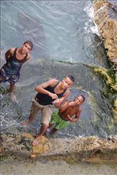 Cash in hand - nothing is free theses days. A group of Cuban boys were playing chicken with the waves on El Malecon Habanero in the old part of Havana. When I produced a camera, they demanded money!: by rebeccarou, Views[389]