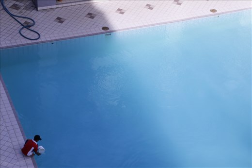 In the morning, the keeper of this place would rise early to attend to the chores around the premise. He tends to the gardens – all the trees, every plants – and he cleans the drains, etc. Morning to morning, he would clean the pool and sprinkle white chlorine powder into the pool. It reminded me of magical fairy dusts. It also made me wonder if anyone else notices him at all as he attend to all the chores in a place we call home. I did not grow up here and I only came to live here when I returned from my study abroad. This may be a condominium but the premise is still considered our home too. He is, in one way or another, keeper of many homes. 