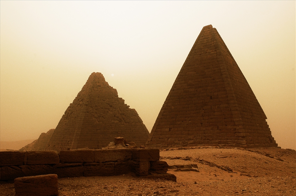 A sandstorm engulfs ancient Nubian pyramids near Karima, Sudan.