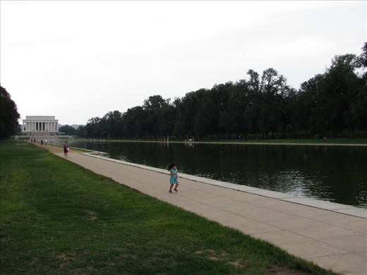 Freedom is lifeblood, and flows through the veins of all peoples. In this shot, a little girl is racing her mother along the Reflecting Pool in Washington DC.
