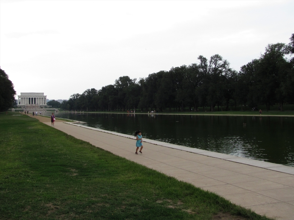 Freedom is lifeblood, and flows through the veins of all peoples. In this shot, a little girl is racing her mother along the Reflecting Pool in Washington DC.