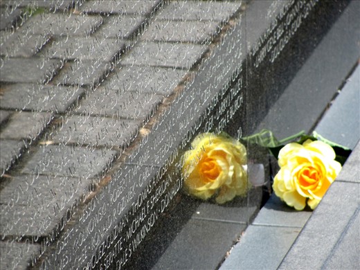 It can be painful to visit the Vietnam Memorial, probably because the pains of that conflict still haven't quite left the people of the world. Many leave momentos at the wall to show love and rememberance for a fallen loved one, and it almost seems as if that love is reflected back to them...