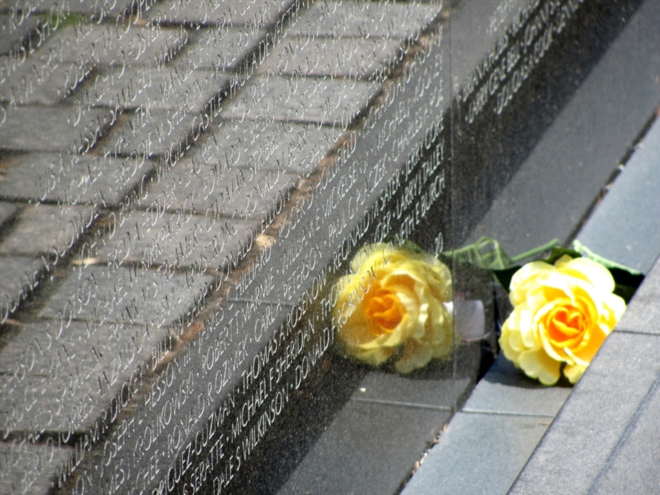 It can be painful to visit the Vietnam Memorial, probably because the pains of that conflict still haven't quite left the people of the world. Many leave momentos at the wall to show love and rememberance for a fallen loved one, and it almost seems as if that love is reflected back to them...