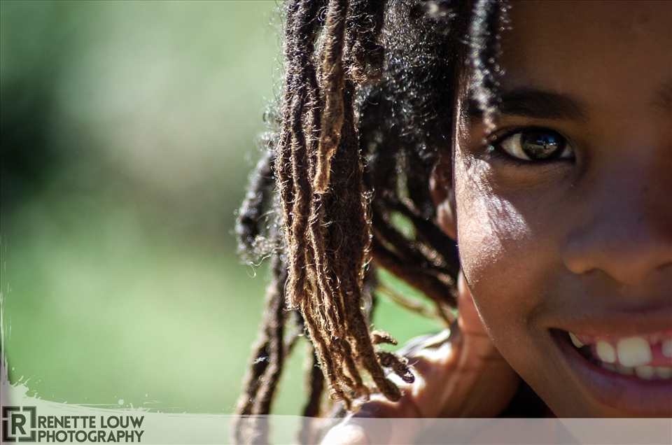 Rastafarian girl in Francshhoek. Very underdeveloped semi-city community.