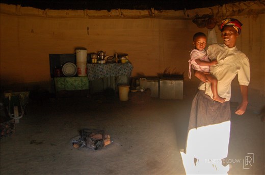 Well-off mother and child in their home in Transkei. Father works in the city.