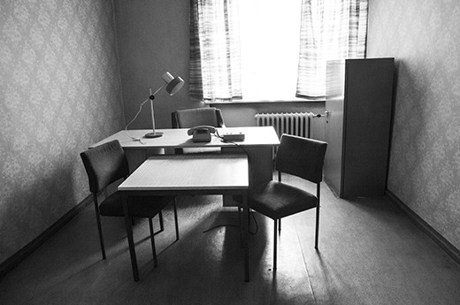 Like all other prisoners, Gilbert was interrogated here multiple times, and always without warning. They could come for you anytime of the day or night, and there was no official time limit on how long the sessions could last. The interrogation room's layout was designed to convey a sense of helplessness for the prisoner - the prisoner's table is slightly lower than that of the interrogator, and there would always be another interrogator seated behind to intimidate. 
Many former Stasi men were never persecuted and are out and about in Germany today. A few years after the fall of the Berlin Wall, Gilbert actually accidentally ran into one of his interrogators at a departmental store in Berlin.