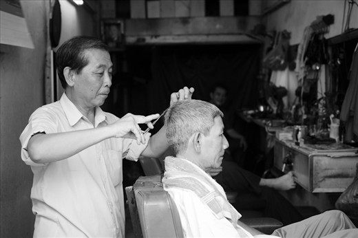 He told me he has been keeping Vietnamese men looking good for 44 years.