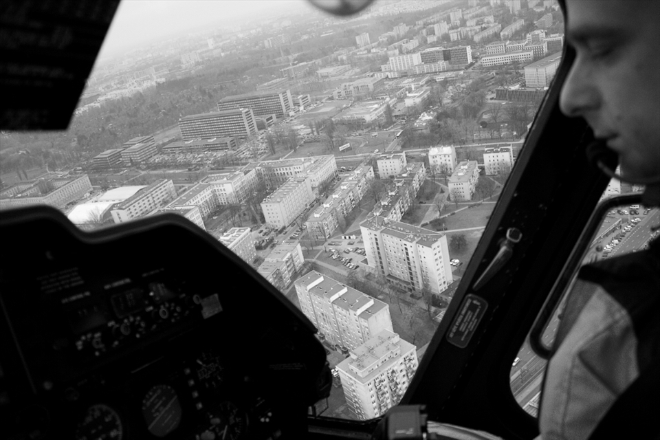 Flying rescue helicopter is very similar to flying military one. Many times you are landing in the spots that are new
for you and are not market. You have to look for power line, trees and analyse shape of the ground where you land.
At the moment most of rescue pilot are ex-military, there is no school for civil pilots preparing them for requirements of the job, 
but there are plans to prepare training for pilots interested to do this kind of job.
