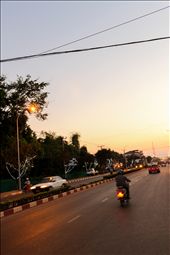 We came into Vientiane just as the sun was setting. The sky was illuminated in soft hues of blue and gold as motorists buzzed all around us. As daylight melted into the Mekong, this city was just waking up. This was a change of pace for me, as my experience in Laos up to that point had been confined to the rural village of Bah Nahin – a one road town that set with the sun. The ebb and flow of work and play was apparent here in the capital, particularly in the barks of bus drivers echoing down the street, as the maze of laneway bars opened their doors to the mix of night-time dwellers.: by rhysacker, Views[445]