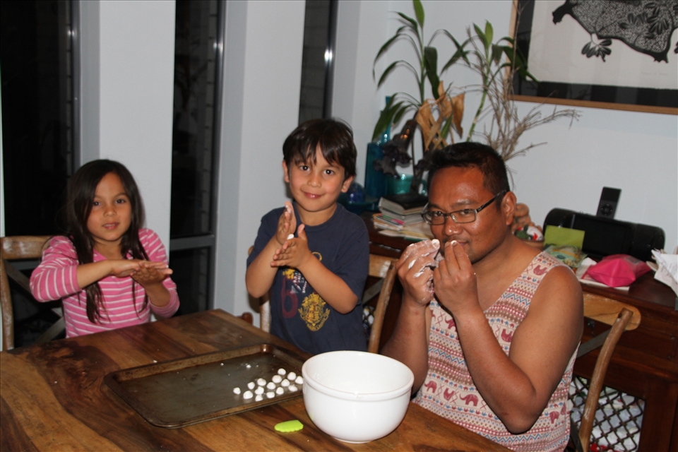Hands on sticky or glutinous rice ball making
