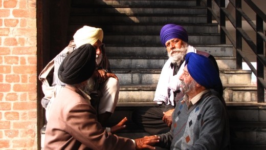 Devotees in conversation - at The Golden Temple in Amritsar.