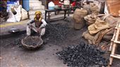 The daily grind: Sifting through charcoal by hand on the busy streets of New Delhi.: by rimaledrifter, Views[481]