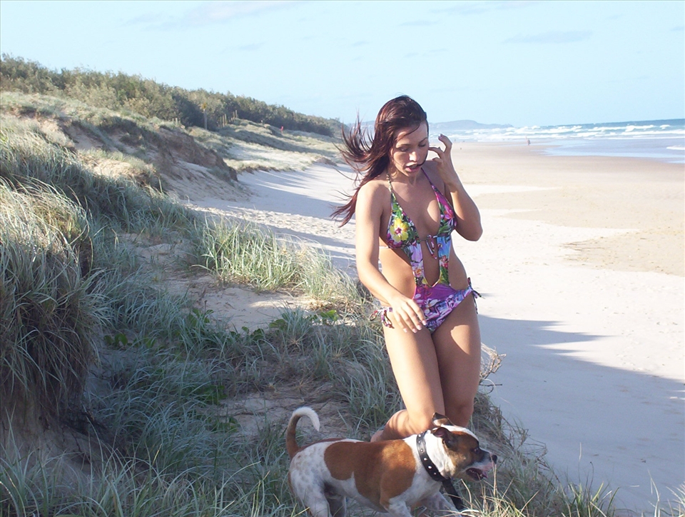 A few of my favourite things.My girl,my dog,white sandy beach and blue water