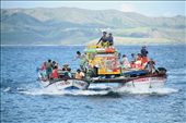 Two fishing boats ferry a jeepney (a common passenger vehicle) to Sabtang Island in Batanes,  The precarious chartered transport costs Php6000 (or approximately US$147) for a one-way trip from nearby Batan Island and has been a local method of transporting vehicles like vans and ambulances between the two northern islands in the province, crossing the vast waters where South China Sea and Pacific Ocean meet.: by rnb, Views[2183]