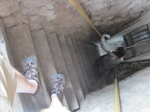 down steeply to the depths ... apparently murals down there somewhere