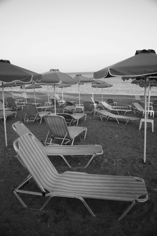 In 2009 I spent three months living in Gennadi, working as a watersports instructor in front of three hotels at nearby Kiotari Bay in the south of Rhodes, Greece. It was quiet in Kiotari. Many of the hotel sun chairs were left empty; a reflection of the slow start to the holiday season as a result of the poor economic climate. Rhodes island is dominated by the tourism industry, with the endless days of sun and consistent wind ordinarily drawing sunbakers and watersport enthusiasts from all over Europe. However at the time, this scene was not uncommon along the east coast beaches.