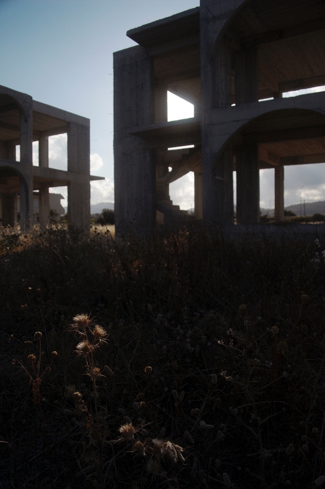 The area surrounding the town of Gennadi, the southern-most town on Rhodes, is littered with silent shells of unfinished buildings, reclaimed mostly by tough, prickly weeds. The area had suffered a notable decrease of investment in recent years, leaving these monoliths towering over the fields that probably would have been home to the once growing community of British expatriate retirees.