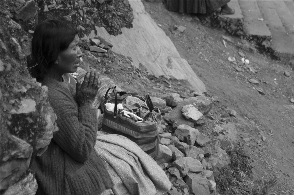 A woman prays under the mountain, Day 2