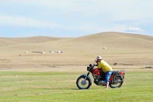I snapped this pic of a nomad having a break and a daydream on his motorbike while we waited for the car to cool down. I often imagine what scene is playing out in the gers way off in the distance.
