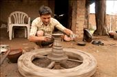 Here, Shakeelbhai has been a potter since he was 9 years old. He is a fourth generation potter and lives here with his family of six. : by rohit, Views[250]