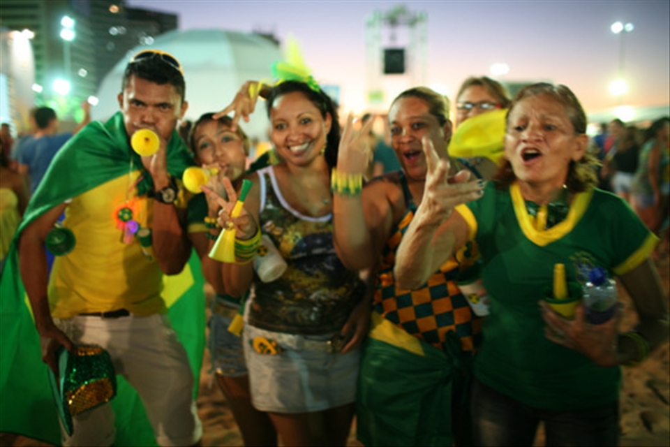 No one is more patriotic than Brazilians during World Cup.  The country is bedecked in the national colors as fans congregate in the public viewing areas to watch Brazil's opening match.