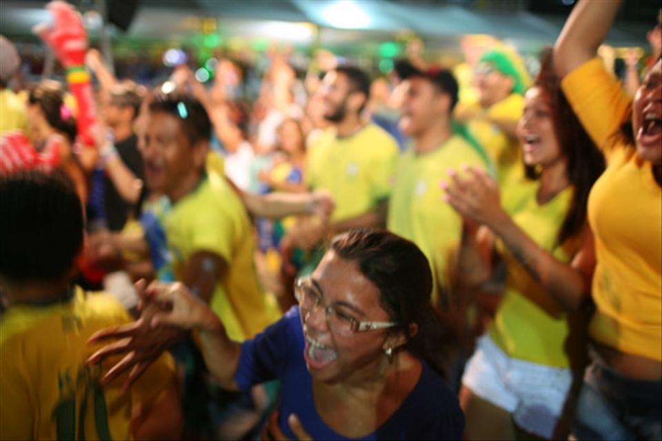Joy erupts as Neymar's penalty kick puts Brazil up 2-1 against Croatia.  A unifying force in a highly diverse country, the national team would carry the hopes of its 200 million people before eventually falling to Germany in the semi-finals.