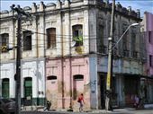 A lone flag flutters in downtown Fortaleza while a few blocks away crowds surge among the towering, modern condos and beachfront restaurants where officially sanctioned FIFA World Cup events take place.: by roka, Views[330]