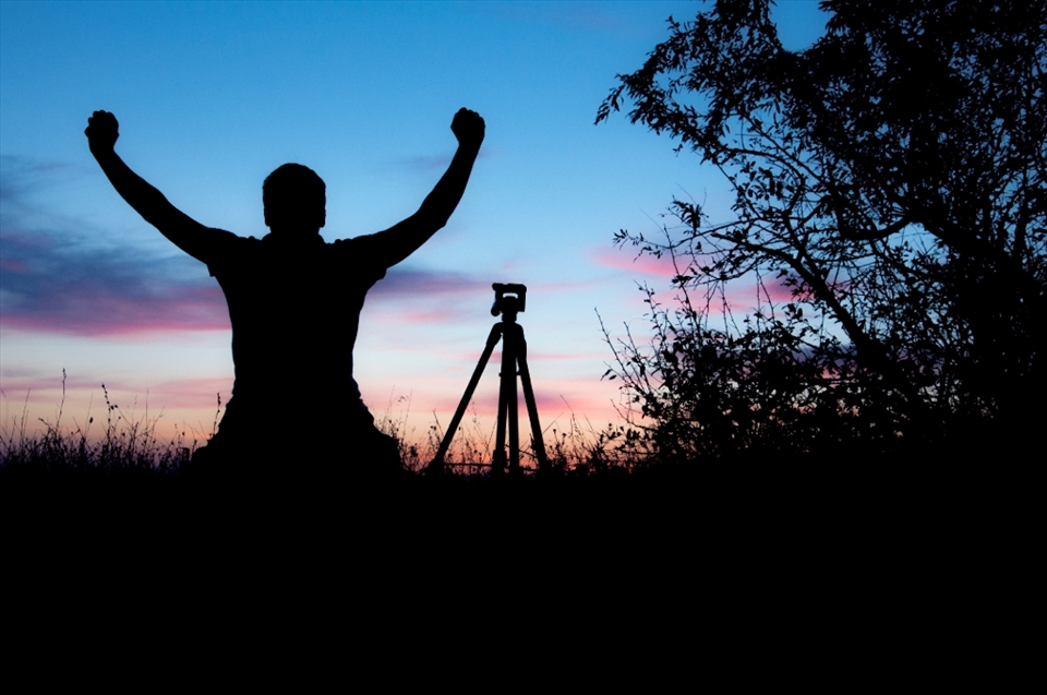 self portrait,trying to express the excitement of taking some nice sunset shots.