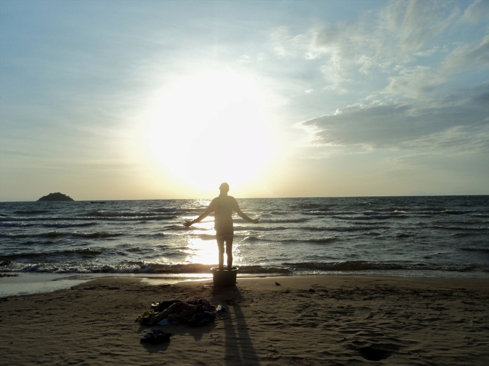  Fishermen in the early morning. 

I  want to represent the story of people of a country through sky. From the work of fishermen on the lake malawi at the daily  of a kid, in the same time make people feel the warm, cozy of this country rich of colors and full of contrast.