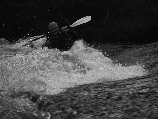 At waters edge, with one paddle securely planted within the white wash its all down to a balancing act with the forces of nature.