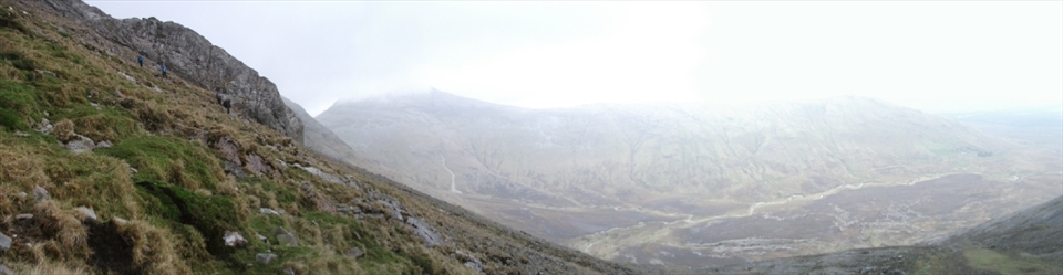 The descent, 4 friends in my climbing party make the final descent of a 3 day/ 2 night hike through the 12 Bends mountain range.  Plagued by high winds and poor visibility it was truely an adventure.