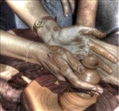 This picture signifies hard work, pains taken to create small earthen pots. I clicked this pic because sometimes even actions can deliver the message.: by ronit, Views[250]