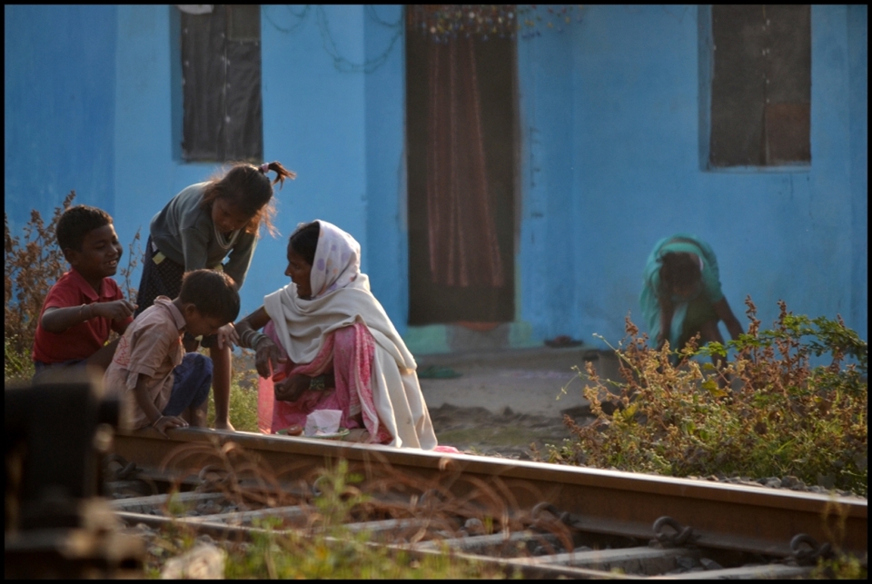 MOTHER'S HAPPINESS LIES IN THE HAPPINESS OF HER CHILDREN. : even after starving herself, mother feeds her children.
