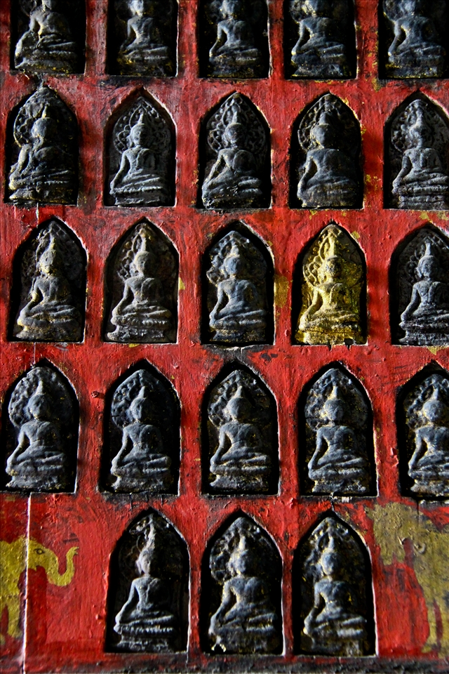 «Old Buddha statues, Luang Prabang, Laos»
Luang Prabang, Laos, December 2012. A collection of old Buddha statues can be found in Wat Xieng Thong. Only one of these statues keeps the original golden colour. This is the most magnificent buddhist temple in Luang Prabang with a beautiful and unique architecture and decoration.