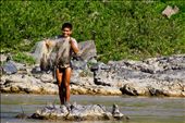 «A fisherman on the Mekong river, Laos»
Mekong river, Laos, December 2012. A fisherman is working while we were sailing the Mekong up on a slow boat, from Luang Prabang to the border with Thailand. Many Lao people, like this fisherman, depend on the Mekong to live.: by rosafurtado, Views[4202]