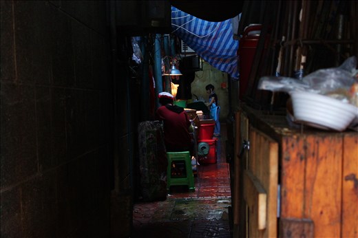 Activity in a dark alley in Bangkok