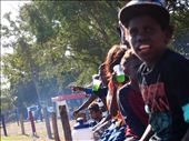 The young boys cheering on their brothers during the footie match. Education is present, but the youth still struggles to preserve their culture, as many of them speak only english and a creole version of the dialect used in all of the Arnhem region. : by roselzimm, Views[954]