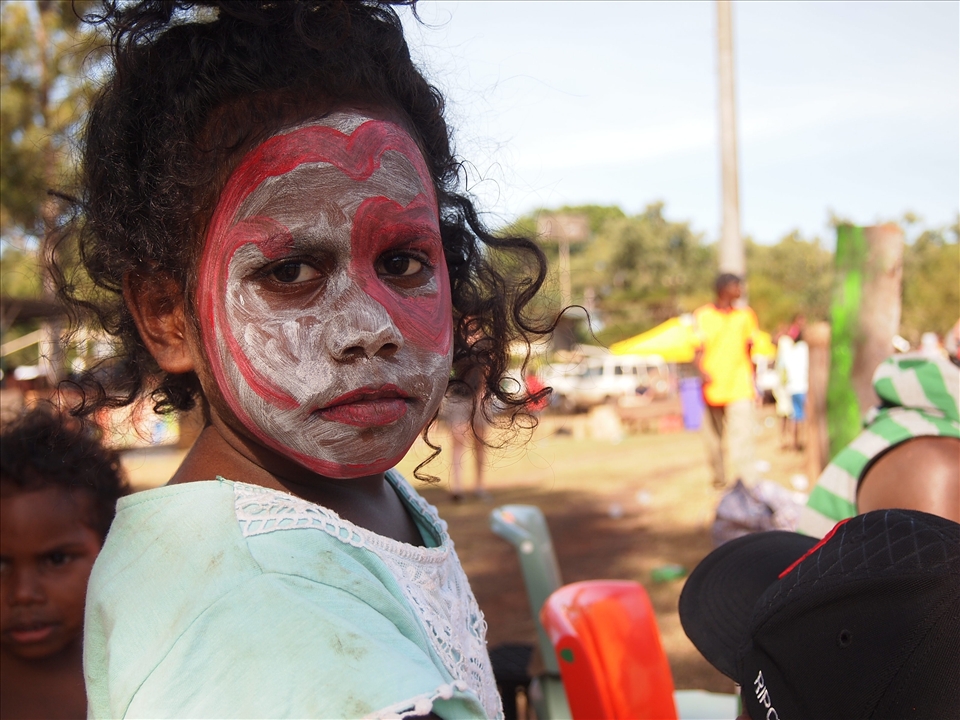 The Anindilyakwa people of Groote Eylandts cultural event. One people one voice: footie, bush takka, dampar making, music, and face painting for the children. A somber face maybe in reflection of how their home has changed so rapidly. In the light of two very different worlds trying to cohabit Groote peacefully, the strain is present.