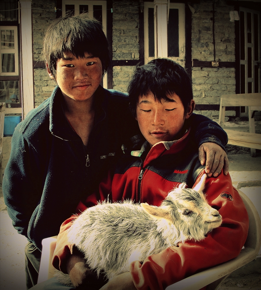 ...and the Young....
Namaste! 
they say, giggling  trough their age of innocence.Childhood similarities are present everywhere and strong essences are hidden in small things.....may you have a careless youth and an easygoing life! -

