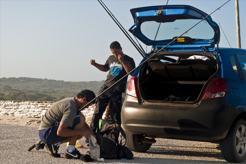Ruquet and his good friend, Etienne, get their rods ready before heading out 