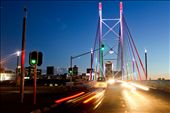 The Nelson Mandela Bridge in the CBD of Johannesburg. The bridge spans 250m and boasts the rainbow-coloured lights of our South African flag at night, lighting up the city and the traffic of taxis and travellers.© Robynne Peatfield 2012: by rpeati1990, Views[1854]