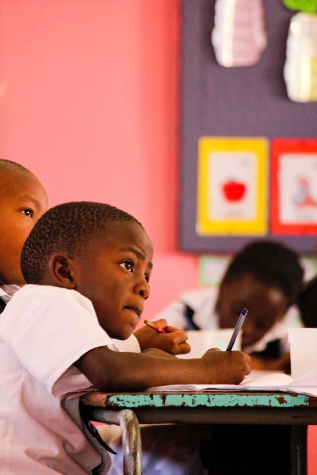 A learner at Thobeka Primary School in Soweto in Johannesburg. Education is a struggle and an expansion in South Africa, where we only have a 24.3% university entry pass rate. After spending a couple of days at this school, these children are on a road where there is no passion to be found in playing small and in settling for a life that is less than the one they are capable of living, no matter what their circumstances.© Robynne Peatfield 2012