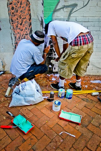 Jade and Breeze, life-long friends and artists on the streets of Newtown in Johannesburg. Speaking to them, they told me graffiti is one of the few tools they have to get by when times are hard; art, expression and entertainment are always rife in Johannesburg when contentment is not.© Robynne Peatfield 2012