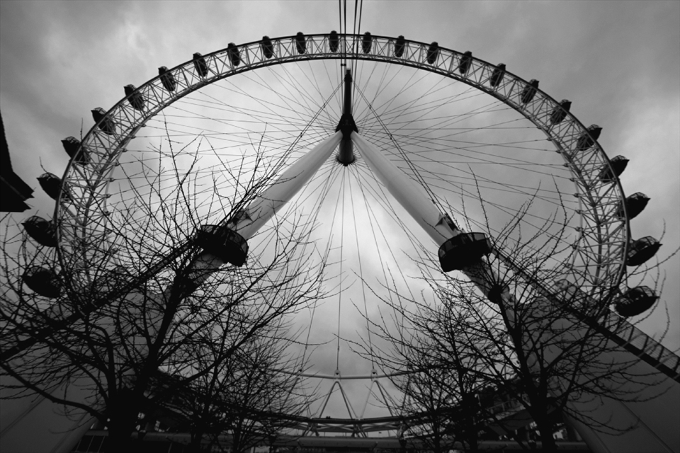 I title this A Different Take because while in London many photographers choose to take a distant shot of The Eye. Using a Canon ultra wide lens I was able to catch this piece from the base of the wheel giving a different perspective. The combination of lousy weather and not much coloration made the black and white option a rather great one in this case.