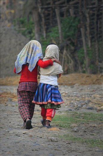 In the Chitwan National Park area of Nepal live that Tharu people.  They have preserved their culture, and live simply,  as they have for generations.