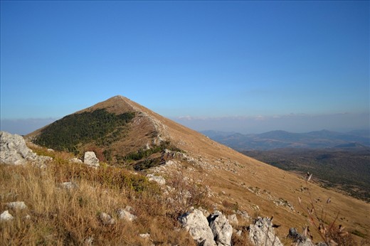 For some New Age believers, the pyramidal shape of the mountain is due to it containing an alien pyramid emitting mystical energies. Many people have flocked here prior to the predicted Mayan Doomsday, believing it will protect them.