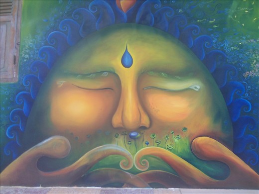 Part of a colorful wall mural by the guest house where I stayed. 